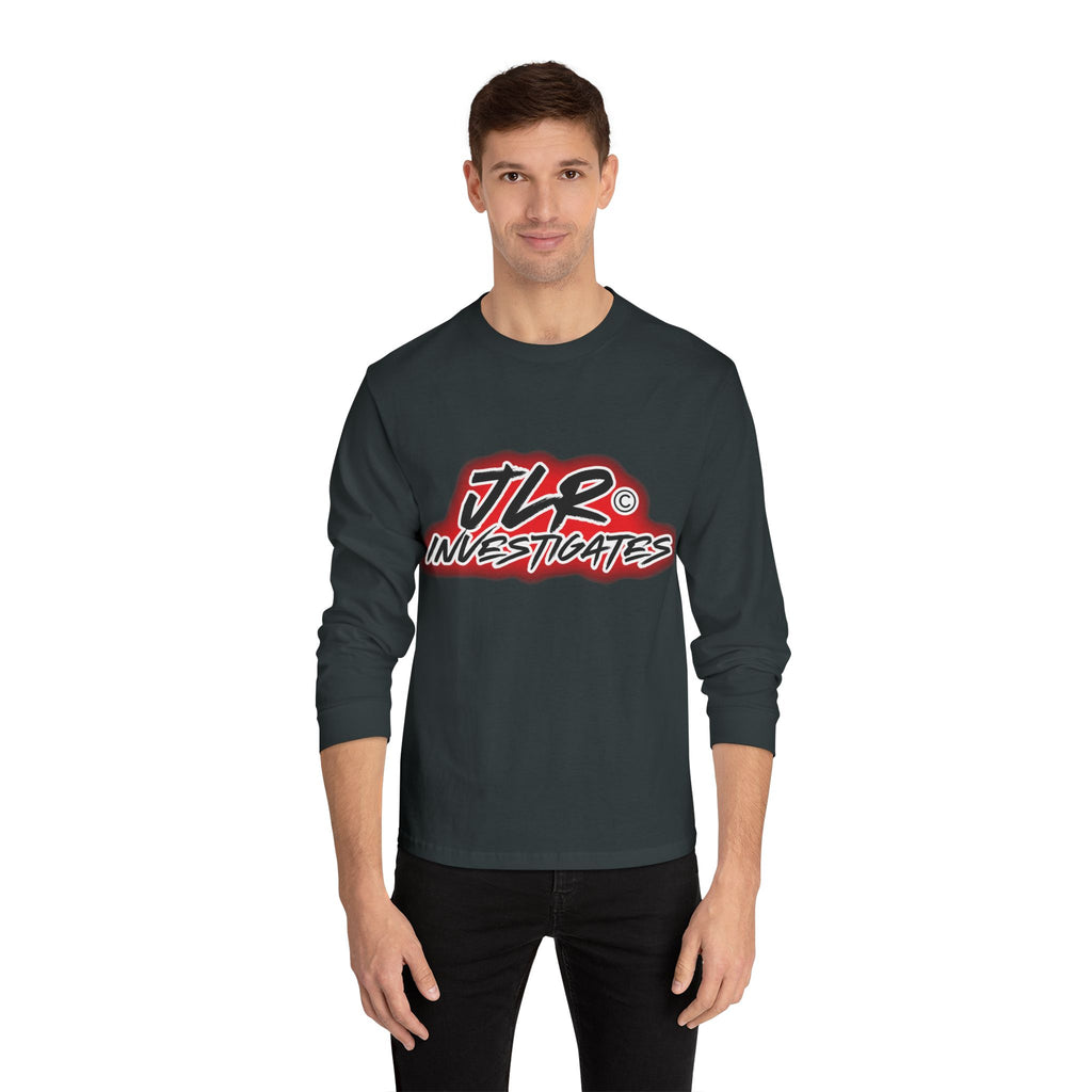 Man wearing Black long sleeve unisex t-shirt featuring bold 'JLR© Investigates' graffiti-style logo in red, white, and black