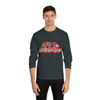 Man wearing Black long sleeve unisex t-shirt featuring bold 'JLR© Investigates' graffiti-style logo in red, white, and black