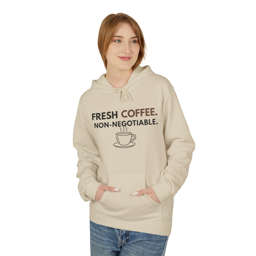 Fresh Coffee Hoodie – JLR© Investigates, sand, worn by model, front angled view