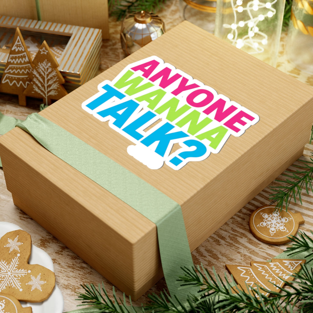Anyone Wanna Talk? colorful vinyl sticker displayed on a kraft gift box — JLR© Investigates