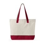 Back view of Beige tote bag with red handles and bottom on a white background