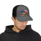 Model wearing black patriotic trucker hat with American flag graphic, side view