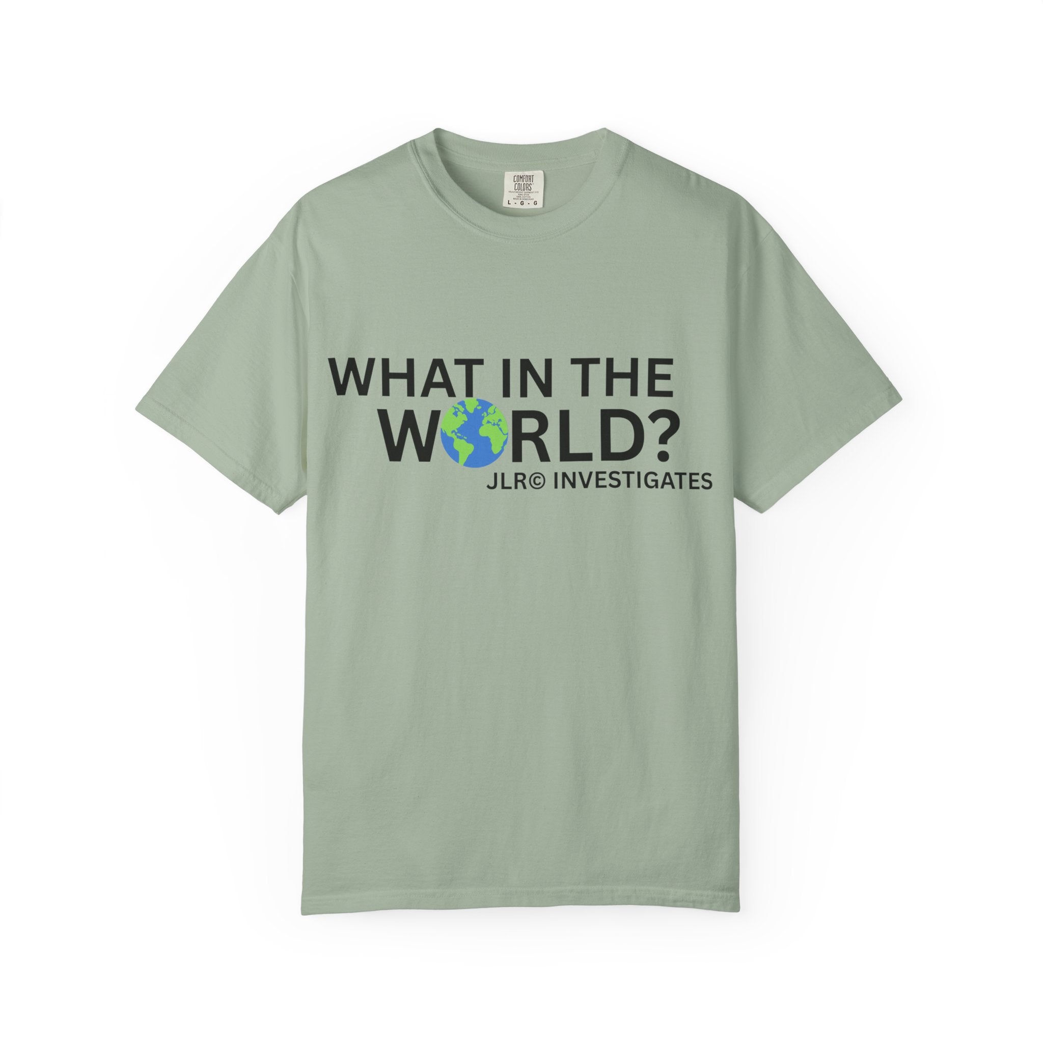 Bay Green unisex t-shirt featuring bold black text 'What in the World?' with a globe replacing the 'O' and 'JLR© Investigates' subtext below