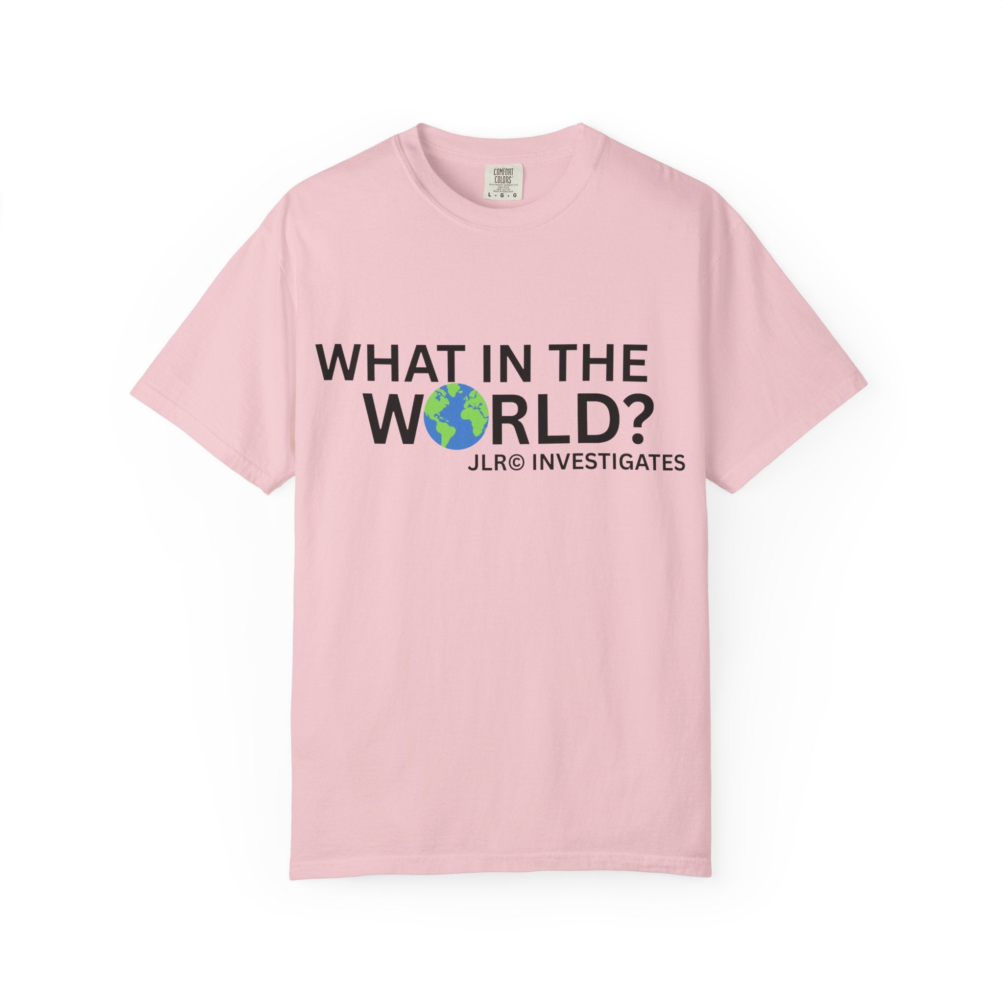 Light pink unisex t-shirt featuring bold black text 'What in the World?' with a globe replacing the 'O' and 'JLR© Investigates' subtext below