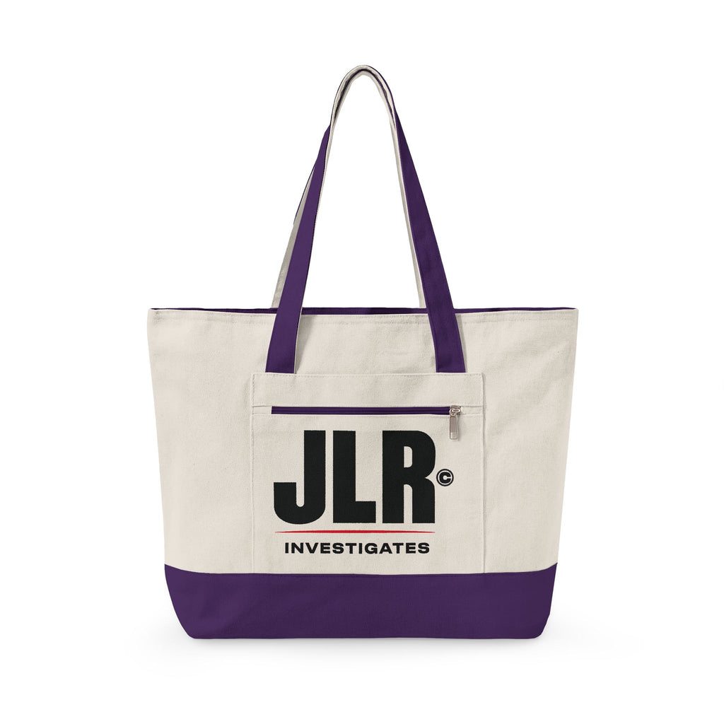 A canvas tote bag with an off-white body, purple handles and bottom trim, and a large black 'JLR INVESTIGATES' logo on the front pocket, shown on a plain white background.