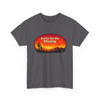 Charcoal unisex t-shirt featuring a bold 'Justice for the Missing' graphic with a desert sunset silhouette of saguaro cacti in warm red, orange, and gold tones