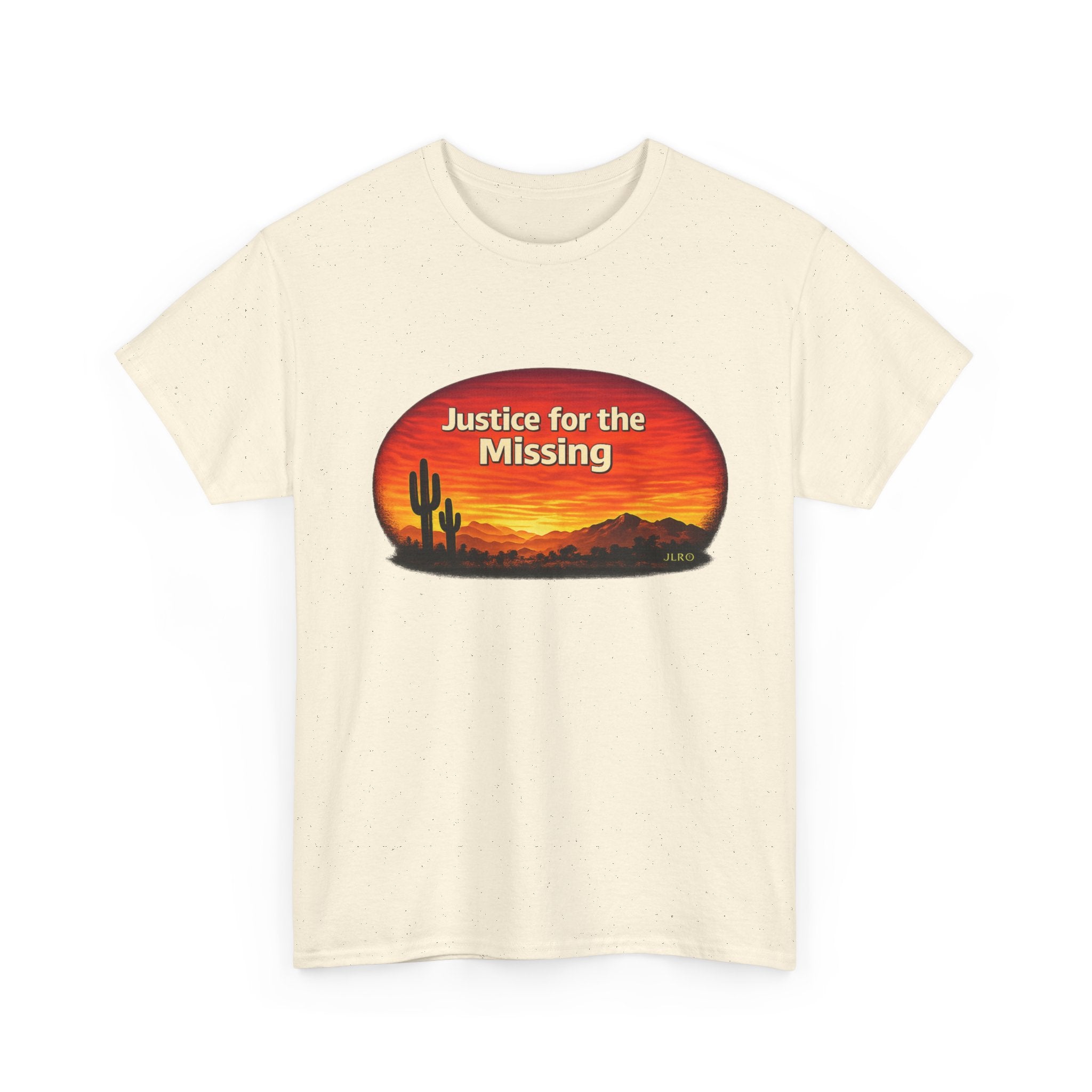 Natural unisex t-shirt featuring a bold 'Justice for the Missing' graphic with a desert sunset silhouette of saguaro cacti in warm red, orange, and gold tones