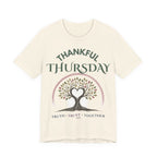 Cream unisex Thankful Thursday t-shirt with tree of life heart graphic and Thankful Thursday Try Them Trees Together text on front