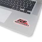 JLR© Investigates sticker applied to a laptop keyboard showing bold red and black graffiti-style design