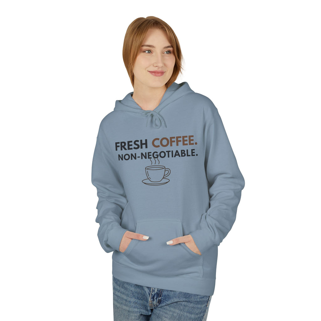 Fresh Coffee Hoodie – JLR© Investigates, stone blue, worn by model, front view