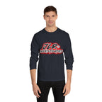 Man wearing blue long sleeve unisex t-shirt featuring bold 'JLR© Investigates' graffiti-style logo in red, white, and black.