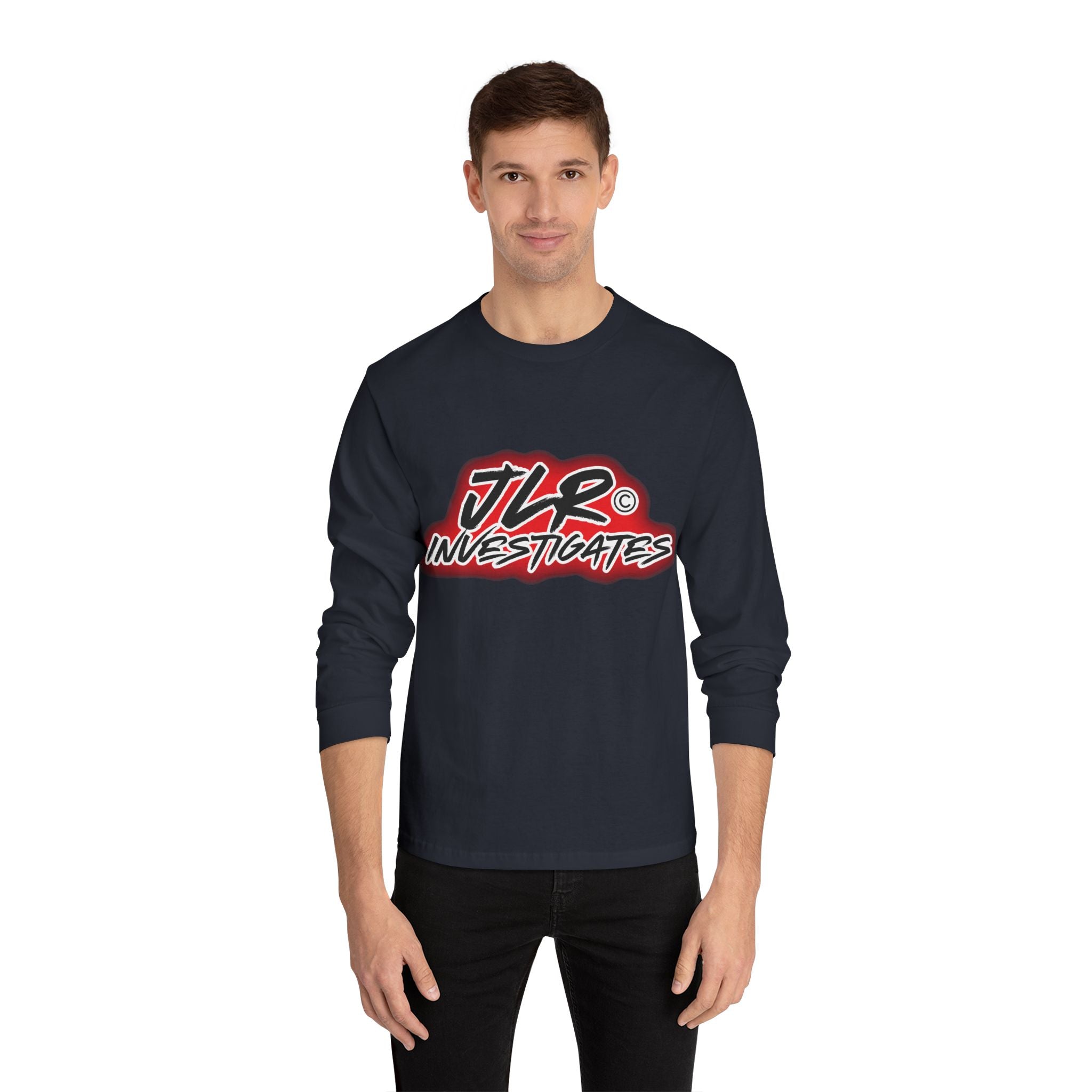 Man wearing blue long sleeve unisex t-shirt featuring bold 'JLR© Investigates' graffiti-style logo in red, white, and black.