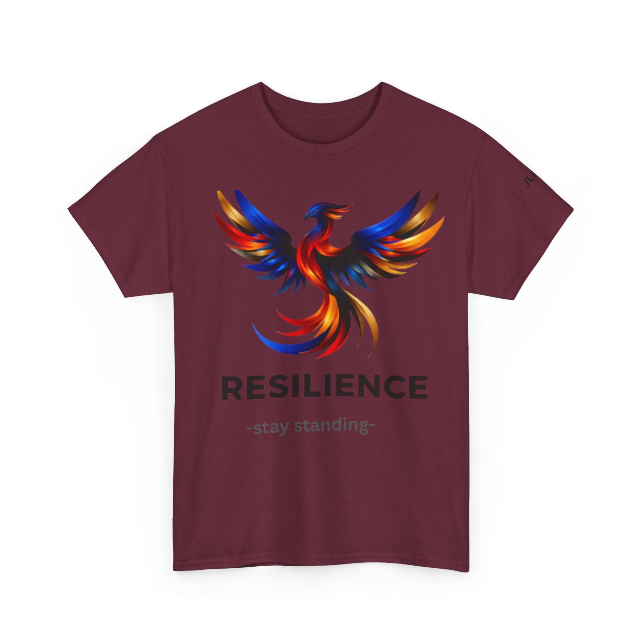 Maroon unisex t-shirt featuring a bold multicolor phoenix rising graphic with the word RESILIENCE and tagline 'Stay Standing' — JLR Investigates apparel