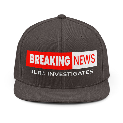 Dark Heather snapback hat with bold red and white "Breaking News" graphic and "JLR® Investigates" text on the front panel, flat brim, structured crown, front view