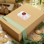 Come On In! sticker applied to a cardboard shipping box surrounded by holiday greenery and ornaments