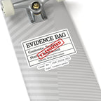 Evidence Bag sticker displayed on a skateboard with badge — JLR© Investigates classified vinyl decal