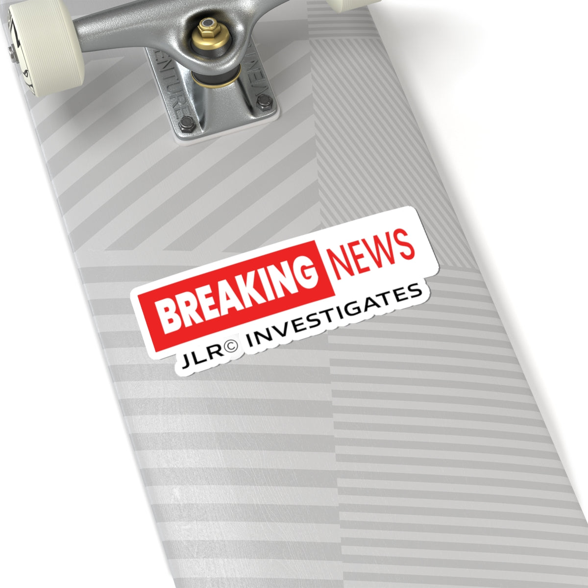 Breaking News JLR© Investigates sticker on a skateboard displaying the red and white logo design