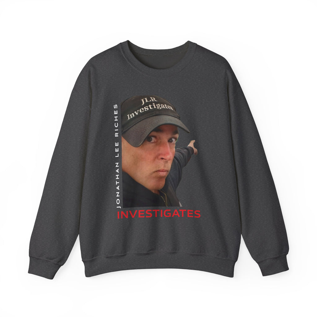 Dark grey unisex crewneck sweatshirt featuring a photo of Jonathan Lee Riches wearing a JLR Investigates cap, with 'Jonathan Lee Riches' in vertical text and 'INVESTIGATES' in bold red lettering on the front