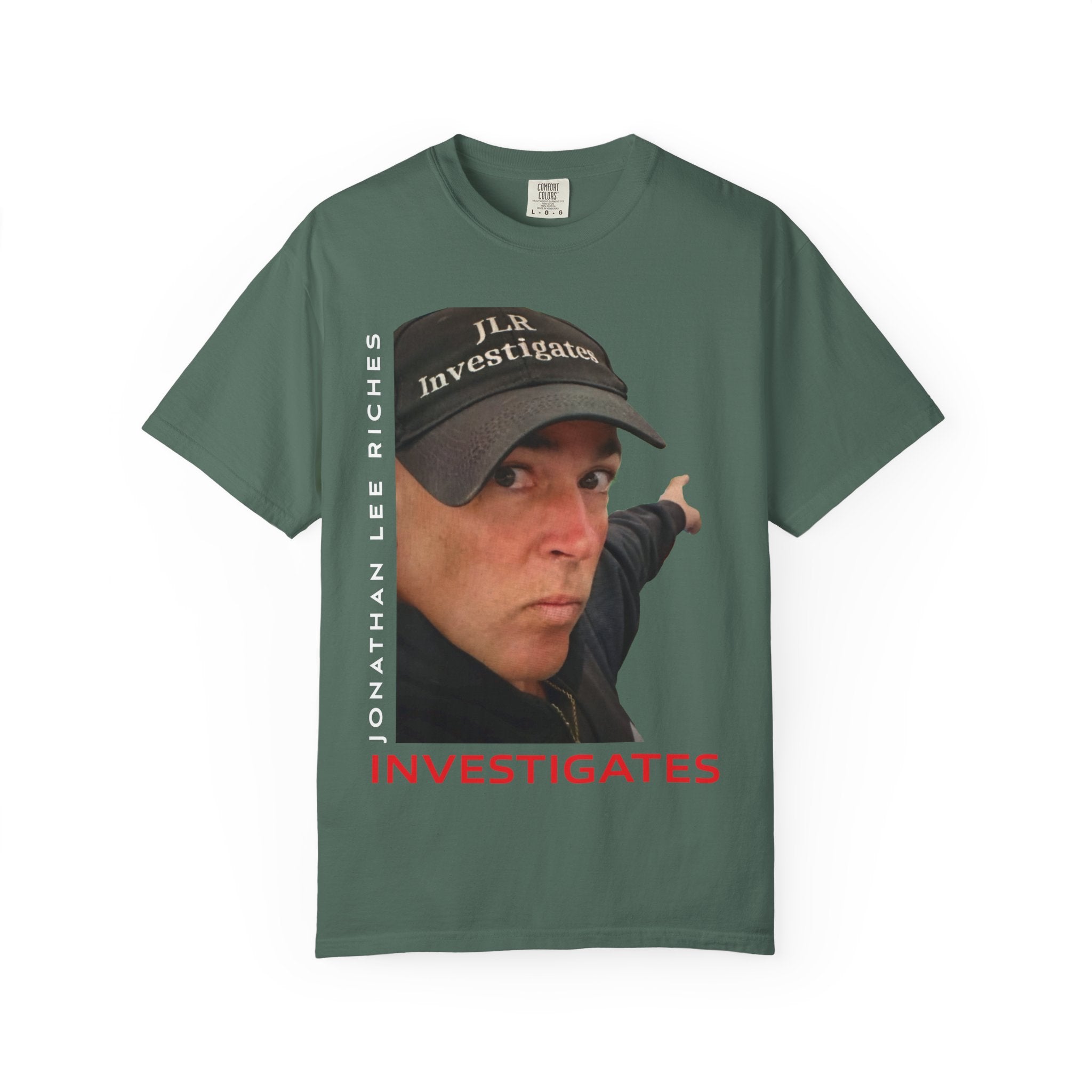 Blue Spruce unisex t-shirt featuring a photo graphic of Jonathan Lee Riches wearing a JLR Investigates cap, with 'Jonathan Lee Riches' in vertical text and 'INVESTIGATES' in bold red lettering below
