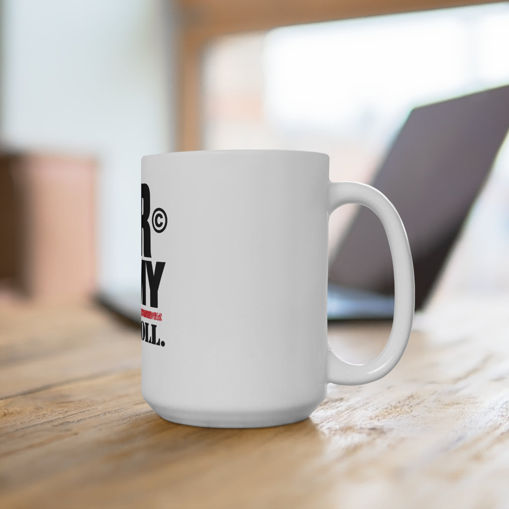 Side view with handle on right of White JLR© Army ‘Let’s Roll’ ceramic mug with bold black lettering, a star detail, and a distressed red stripe on a table with laptop in background