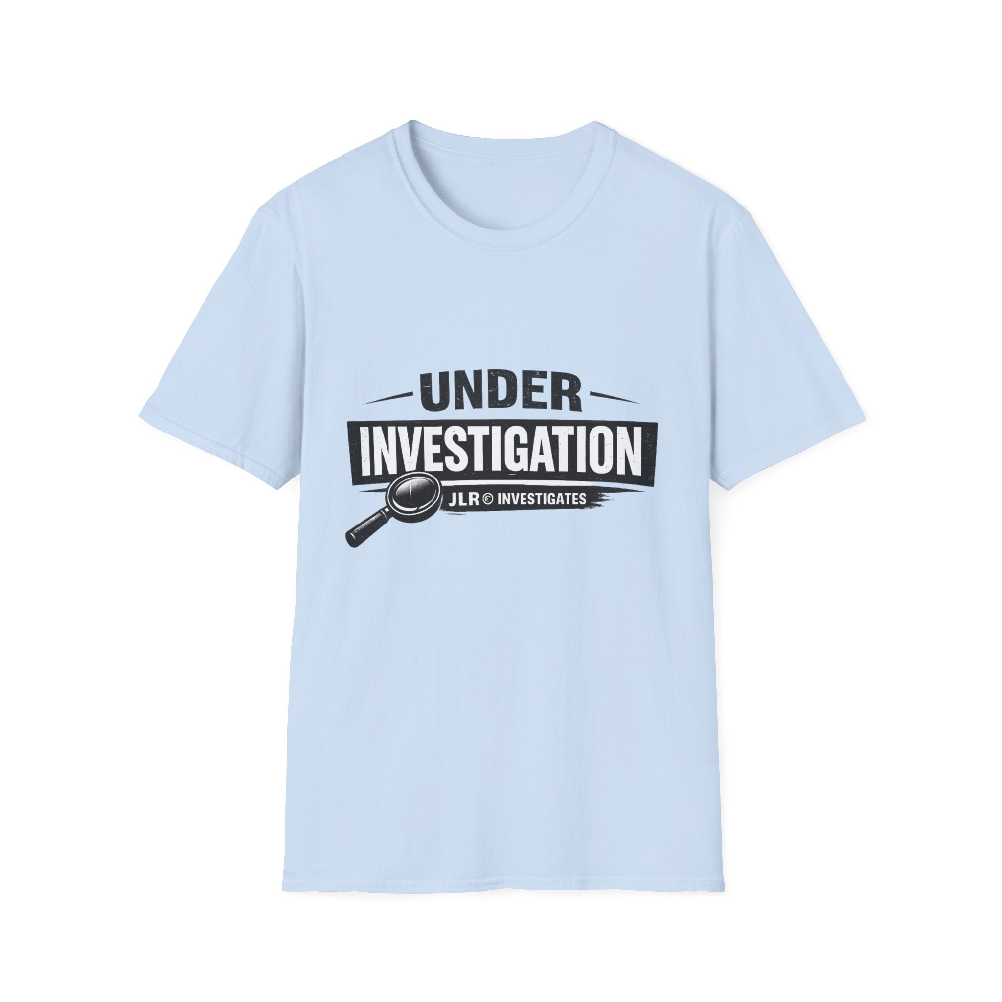 Light blue unisex t-shirt featuring a bold 'Under Investigation — JLR© Investigates' graphic with a magnifying glass icon and black and white banner design
