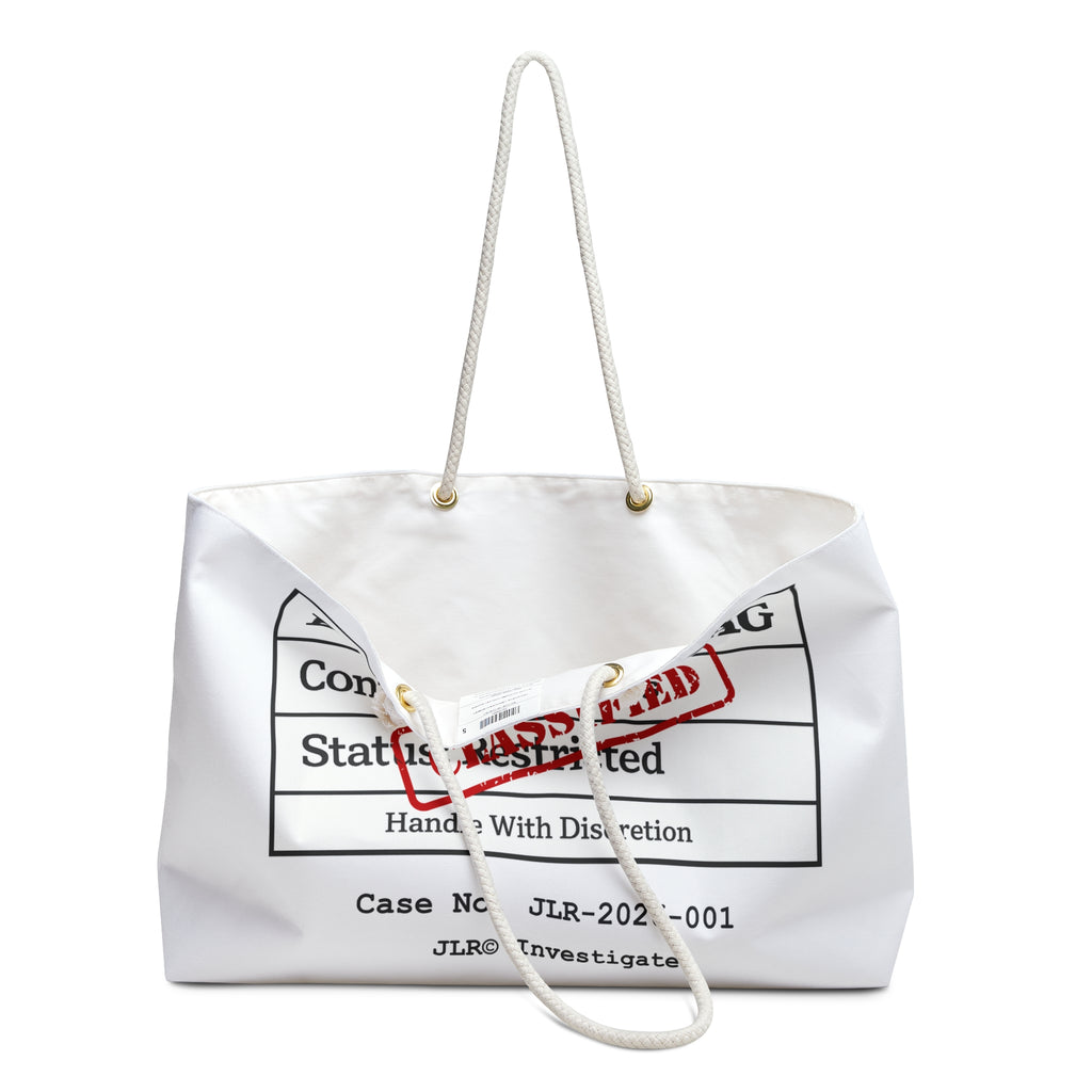 Flat lay of the Evidence Weekender Bag showing full front label design with EVIDENCE BAG text, CLASSIFIED stamp, and JLR© Investigates branding
