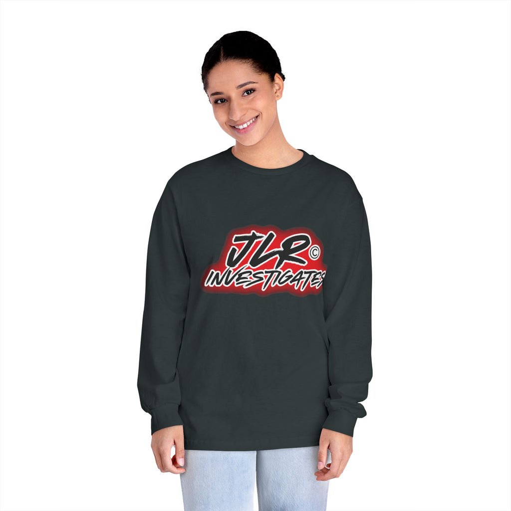 Woman wearing Black long sleeve unisex t-shirt featuring bold 'JLR© Investigates' graffiti-style logo in red, white, and black