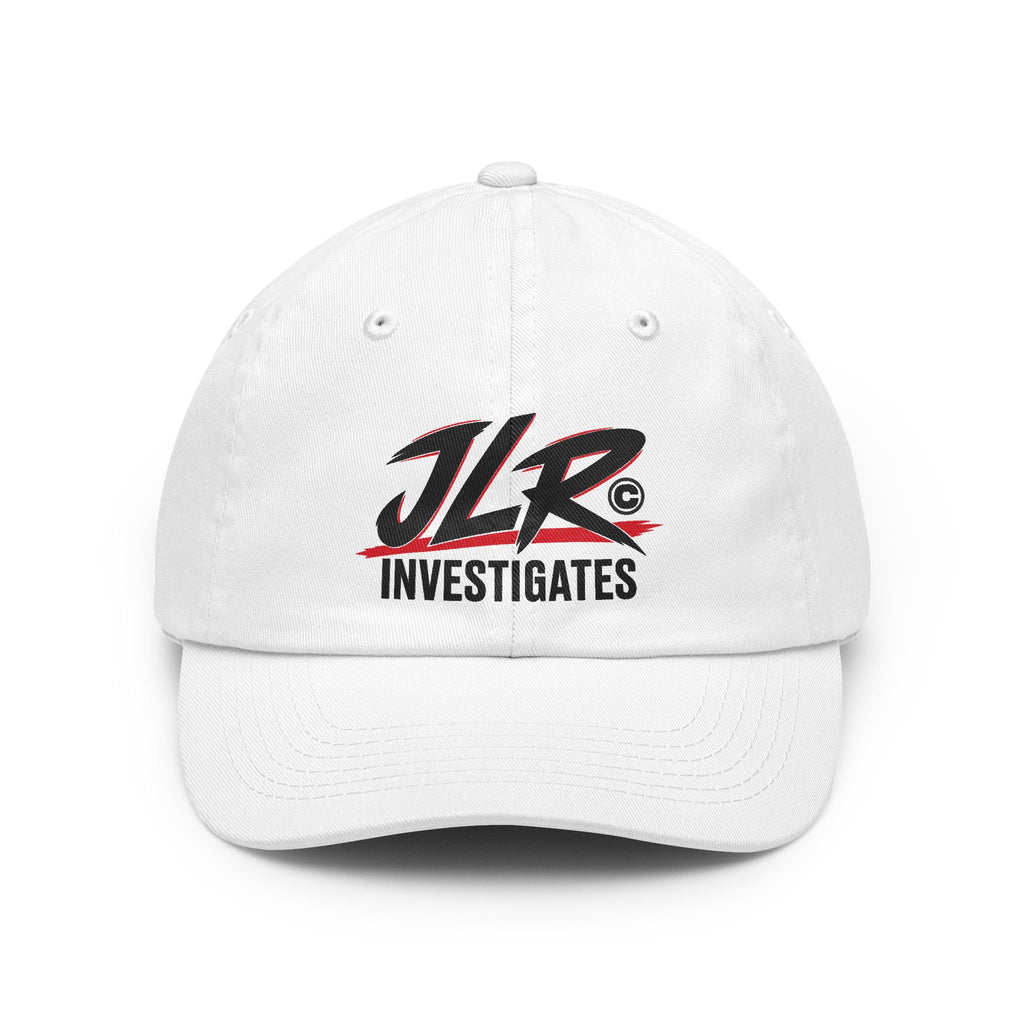 White JLR© Bold Logo Dad Cap with a high-contrast black JLR© Investigates design.