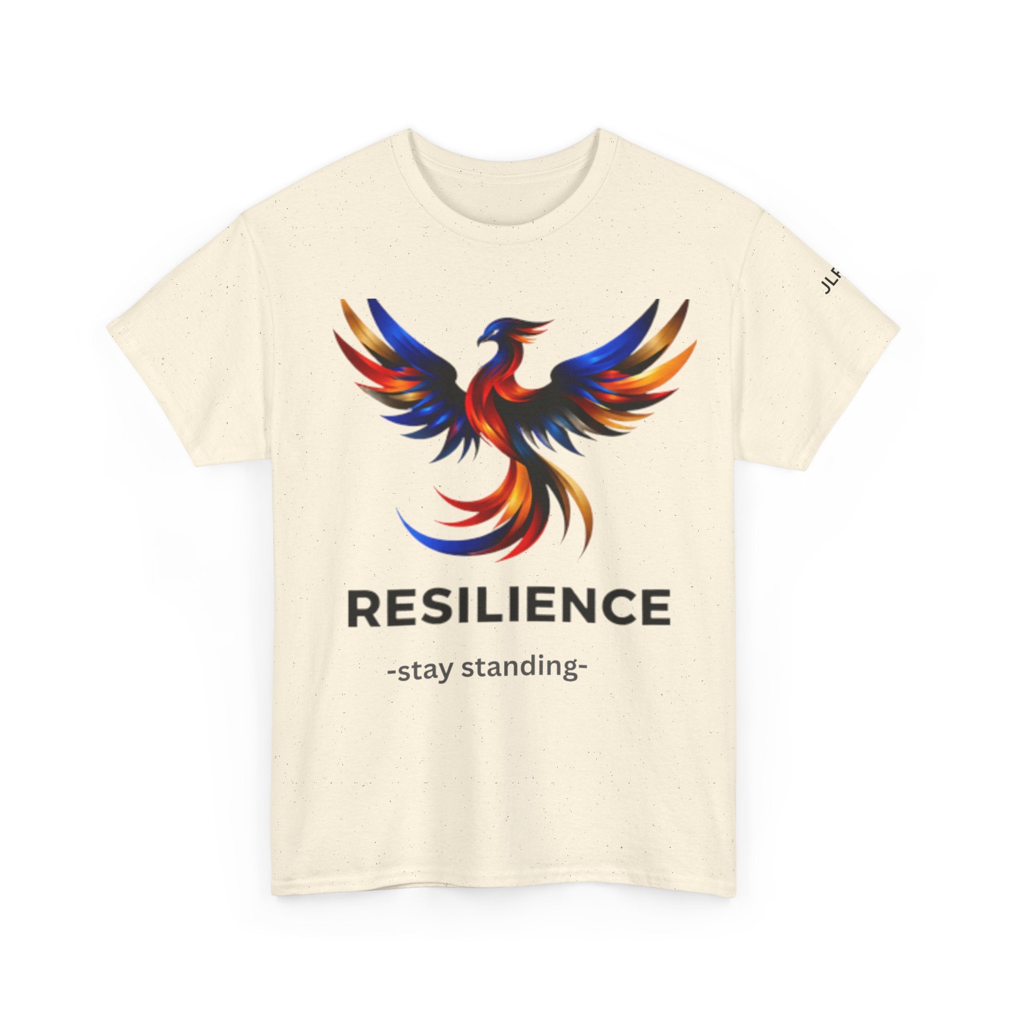 Light beige unisex t-shirt featuring a bold multicolor phoenix rising graphic with the word RESILIENCE and tagline 'Stay Standing' — JLR Investigates apparel
