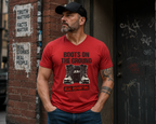 Lifestyle image red unisex t-shirt with bold black graphic reading 'Boots on the Ground' featuring a boot graphic and JLR Investigates branding
