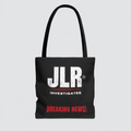 Black JLR© Investigates tote bag with a distressed white JLR© logo and red “BREAKING NEWS!” graphic, displayed front-facing.