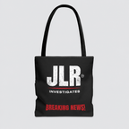 Black JLR© Investigates tote bag with a distressed white JLR© logo and red “BREAKING NEWS!” graphic, displayed front-facing.