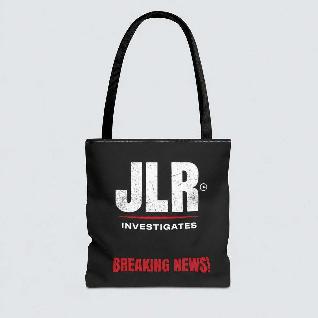 Black JLR© Investigates tote bag with a distressed white JLR© logo and red “BREAKING NEWS!” graphic, displayed front-facing.