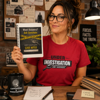 Woman holding a book titled 'J.R.' Investigates Case Notes' in an office setting.