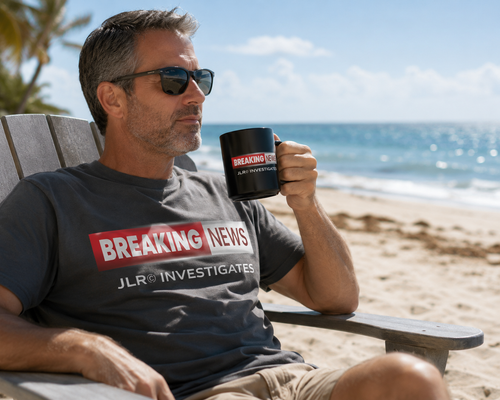 Man sitting on a beach chair holding a mug with 'Breaking News' text, wearing a shirt with similar text.
