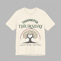 Cream unisex Thankful Thursday t-shirt with tree of life heart graphic and Thankful Thursday Truth Trust Together text on front