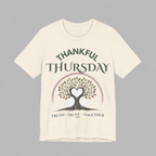 Cream unisex Thankful Thursday t-shirt with tree of life heart graphic and Thankful Thursday Truth Trust Together text on front